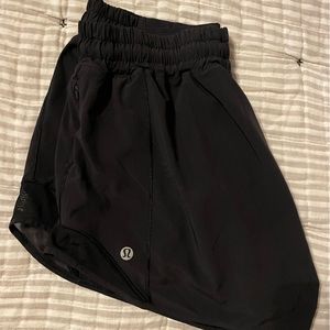 Lululemon black athletic shorts. Size 8 tall.